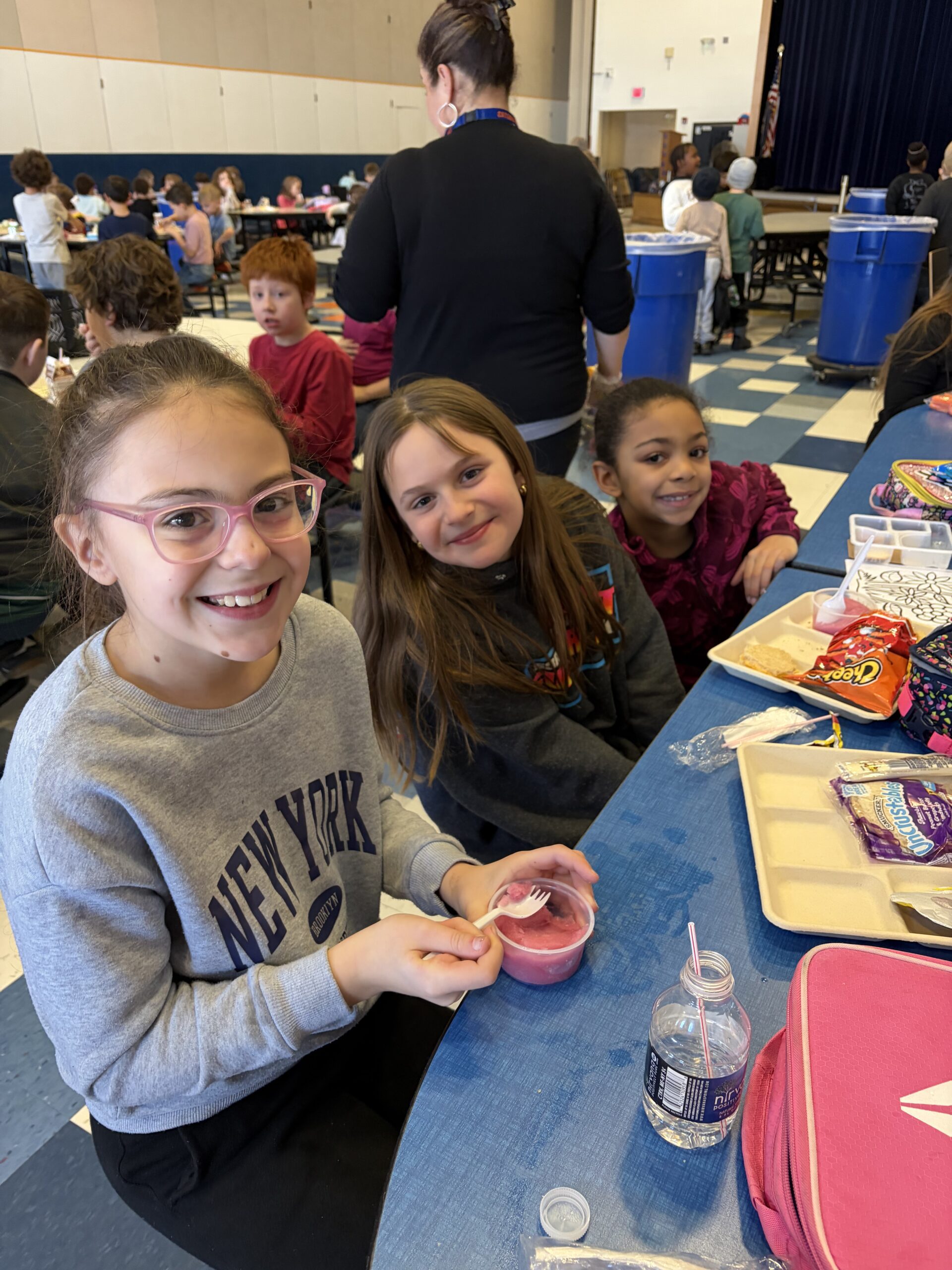 students eating lunch in cafeteria