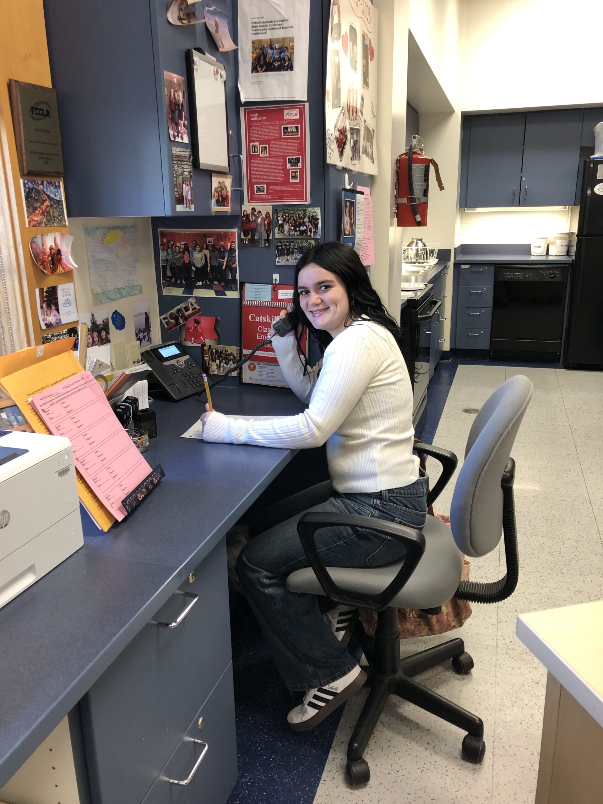 teenage girl conducting phone interview