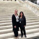 two women standing on NYS Capitol steps
