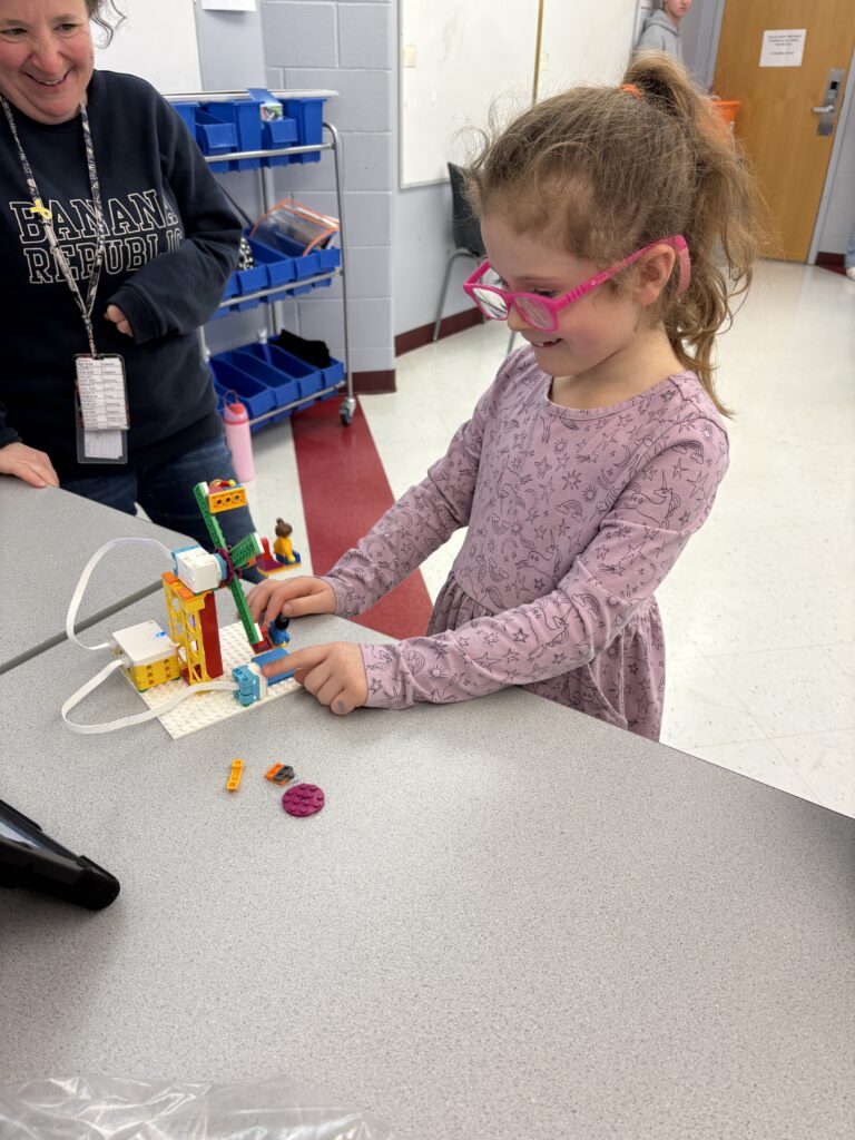 students playing with robots