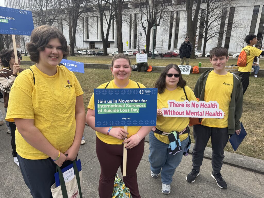 students rallying outside of NYS Capitol