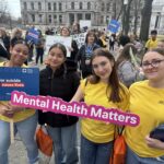 students rallying outside NYS Capitol