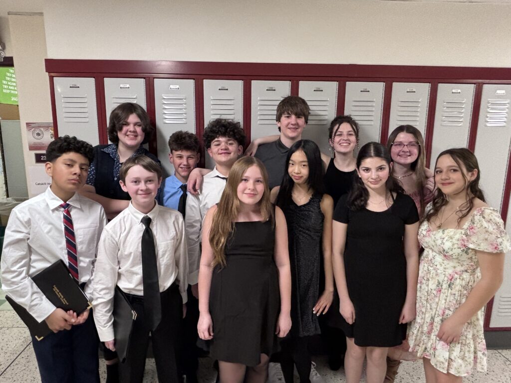 student musicians pose for group photo