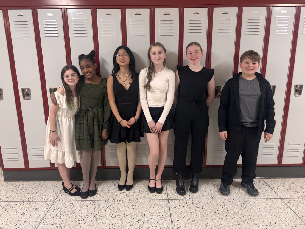 student musicians pose for group photo