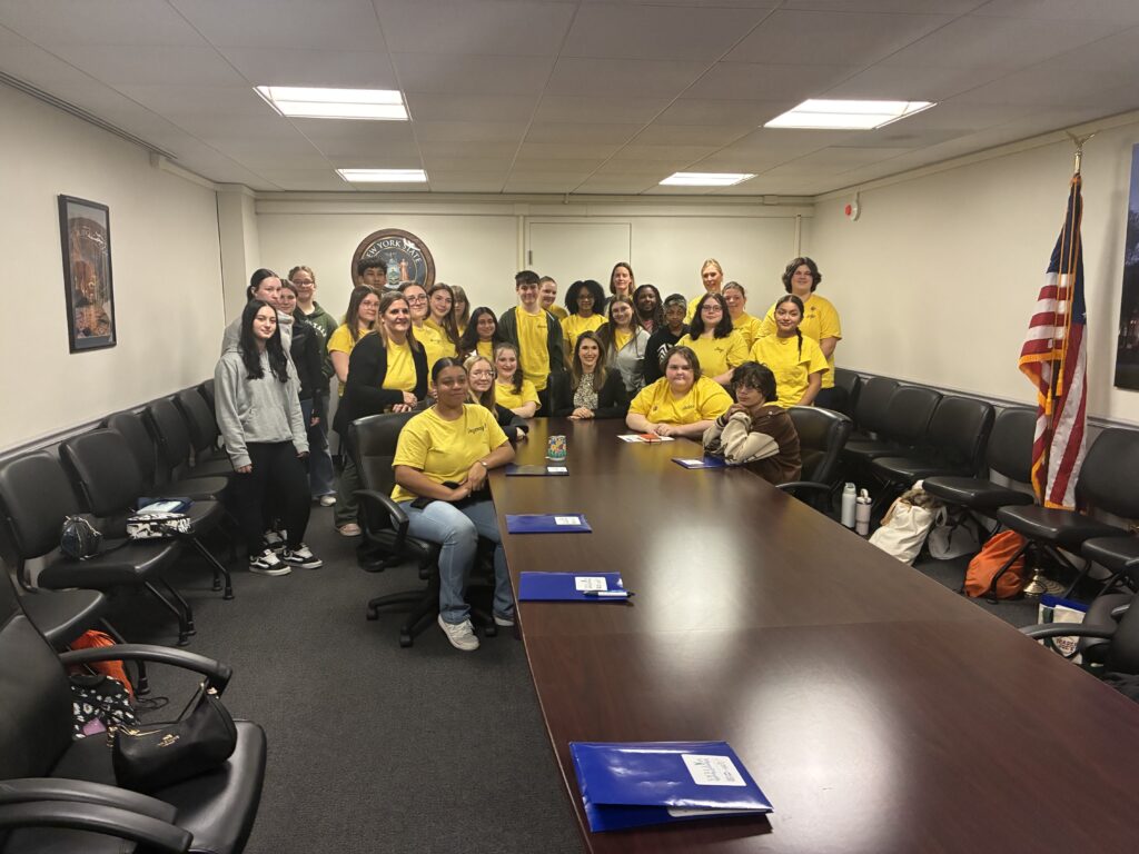 student pose with senator Hinchey