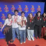 Catskill High School Odyssey of the Mind team poses with trophy and medals at NYS competition.