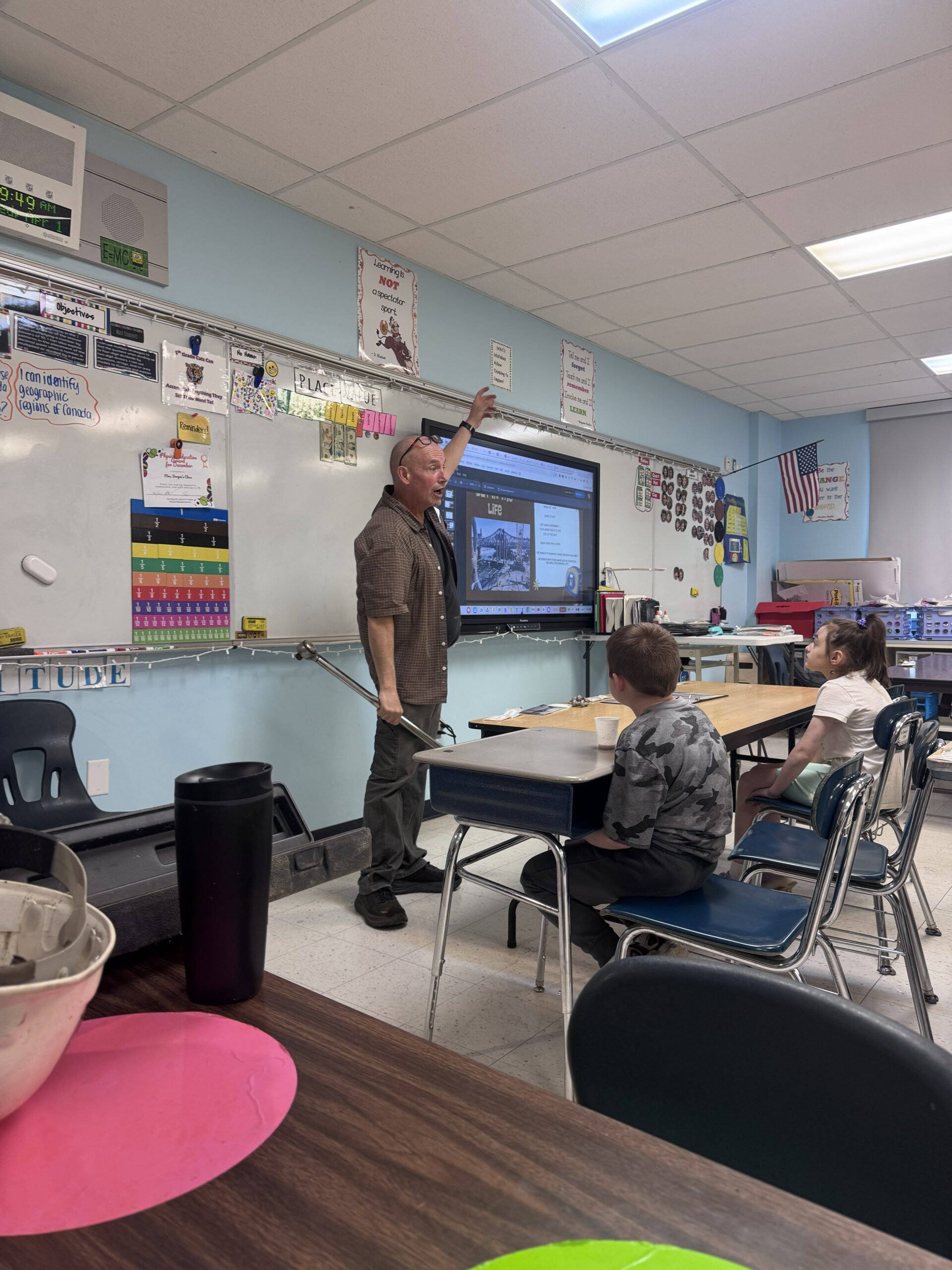 man giving job presentation in classroom