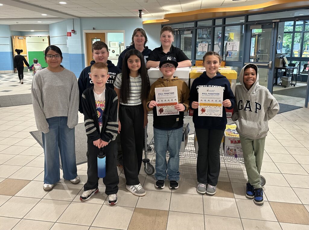 group of students pose with certificates
