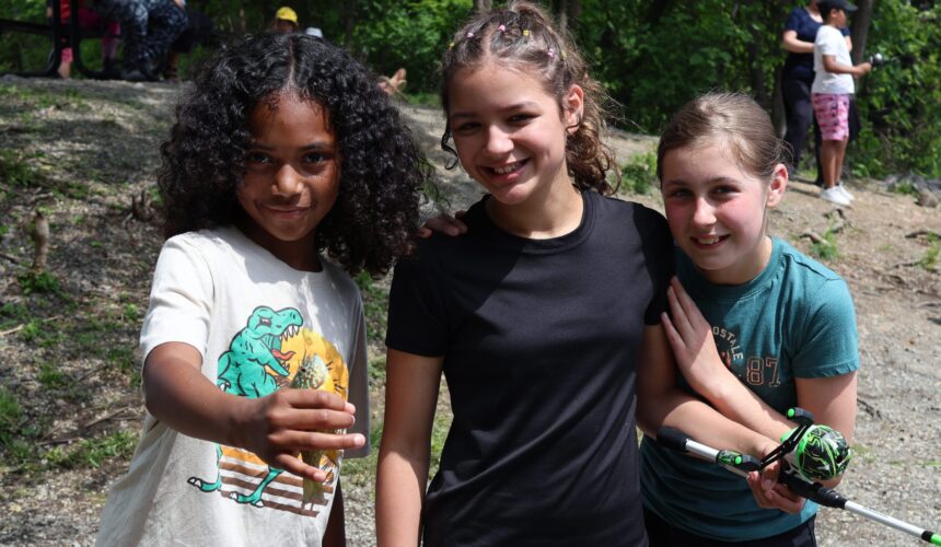 kf1 three girls pose with fish